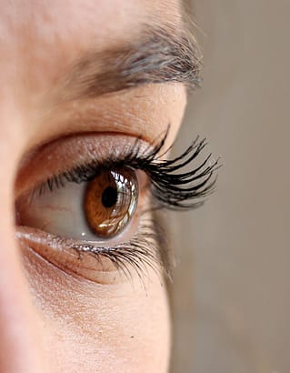 woman face eye eyelashes